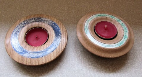 Pair of decorated tea lights holders by Paul Hunt
